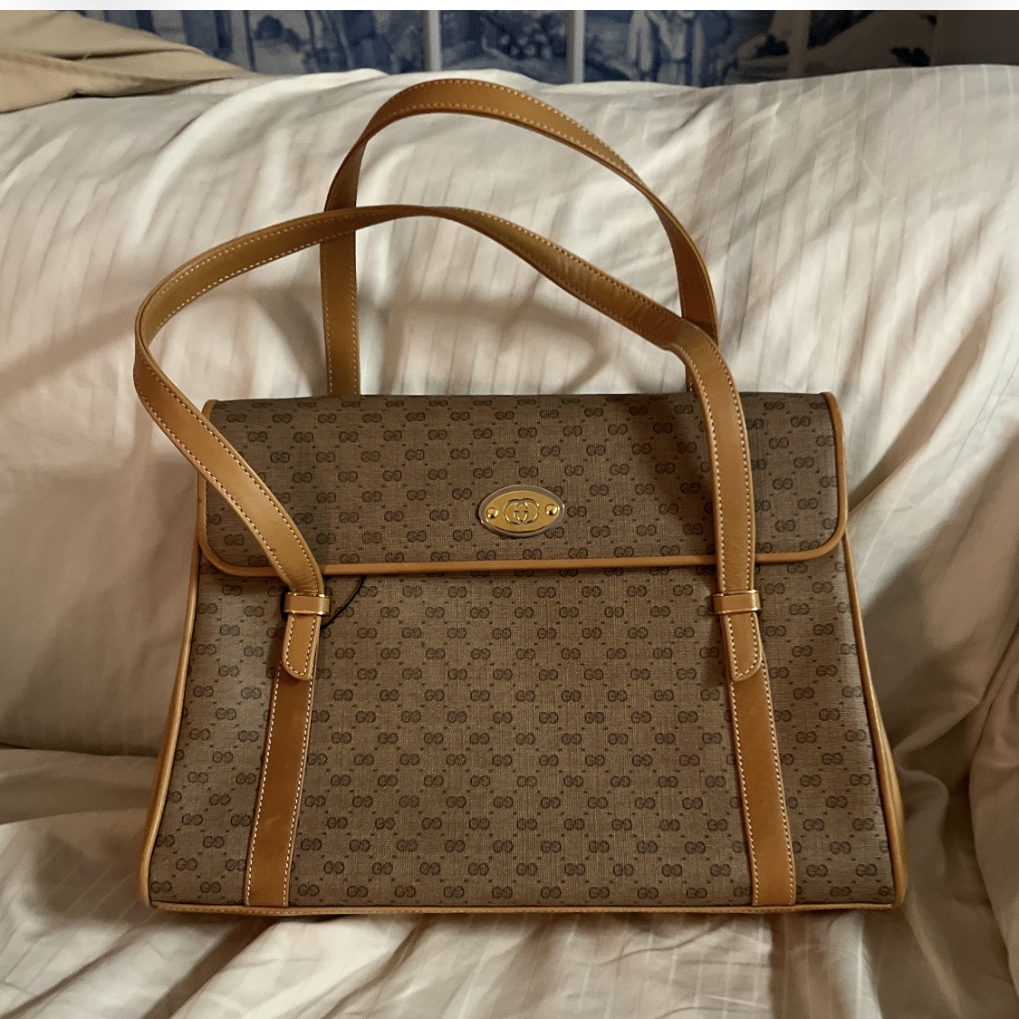 vintage Gucci bag, Gucci GG Supreme, 1970s Gucci, Aldo Gucci era, quiet luxury handbag, heritage Gucci, archival fashion, vintage designer bags, Gucci monogram canvas, top handle bag, investment handbags, sustainable luxury, collector handbags, Italian craftsmanship, timeless designer bags, pre-owned Gucci, luxury resale, vintage luxury bags, Gucci Supreme canvas, old money aesthetic, stealth wealth fashion, classic Gucci, retro designer handbags, vintage fashion investment