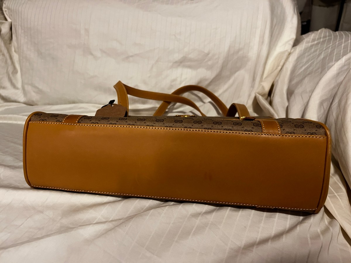 vintage Gucci bag, Gucci GG Supreme, 1970s Gucci, Aldo Gucci era, quiet luxury handbag, heritage Gucci, archival fashion, vintage designer bags, Gucci monogram canvas, top handle bag, investment handbags, sustainable luxury, collector handbags, Italian craftsmanship, timeless designer bags, pre-owned Gucci, luxury resale, vintage luxury bags, Gucci Supreme canvas, old money aesthetic, stealth wealth fashion, classic Gucci, retro designer handbags, vintage fashion investment