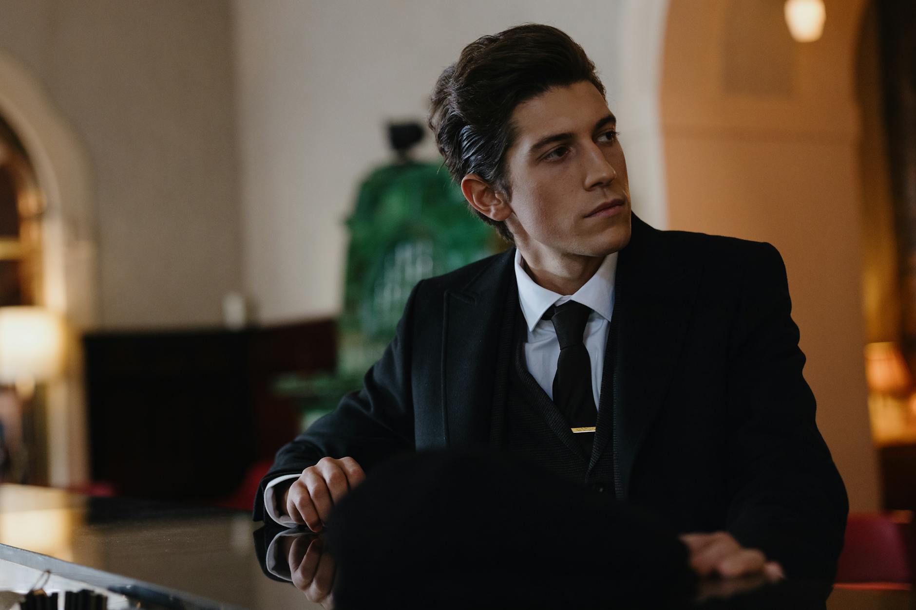 a man wearing a black suit dating high-value men, financially struggling man, self-made man vs daddy’s boy, dating advice for women, spotting ambition in men, evaluating character in relationships, high-value provider types, relationship tips for women, navigating dating a provider, dating smart, love over money, choosing the right partner, setting boundaries in relationships, mutual growth in dating, building legacy with partner, high-value relationships guide, dating men with potential, understanding provider types, wealth vs character in dating, It Girl School dating advice